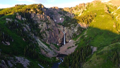 Mountain valley with waterfall