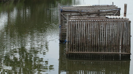 Milkfish farming ponds using bamboo cages in rural areas