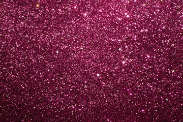 Close-up of deep magenta glitter texture
