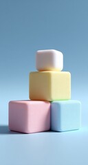 Pastel-colored cubes stacked in a pyramid on a light blue background