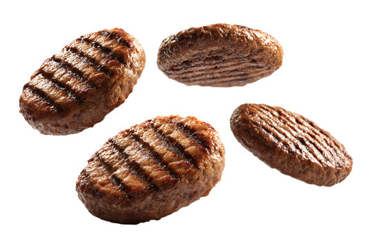 Flying grilled burger patties isolated on transparent or white background, png