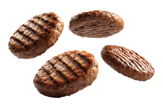 Flying grilled burger patties isolated on transparent or white background, png