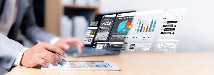 Marketer using digital marketing dashboard with charts, pie graphs, organization chart, and performance data. Concept of business analytics and strategic planning.