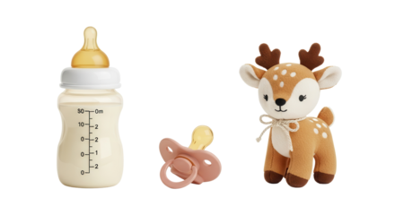 Isolated Baby Feeding Bottle, Pink Pacifier, and Stuffed Deer Plush Toy on White Background