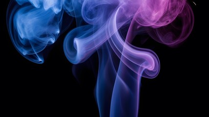 Fototapeta premium Vibrant, dynamic smoke art flowing with blue and purple hues on a black background, abstract