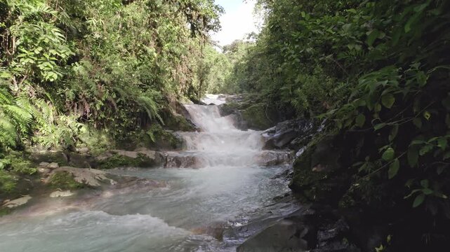 Close-up, drone perspective of the R&iacute;o Toro river turquoise waters, near the well-known Las Gemelas waterfalls in Bajos del Toro, Costa Rica.