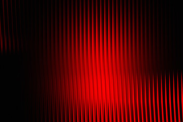 Intense Red Vertical Stripes with Dark Black Gradient Background abstract