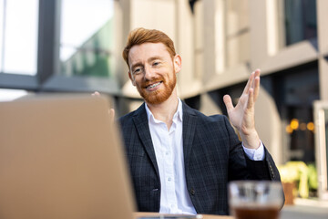 Young man in suit during online call