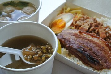 chinese box lunch with pork and rice