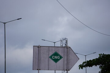 CNG Road Sign under Cloudy Sky © Sumita
