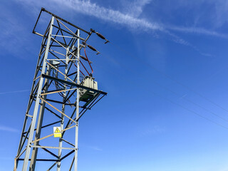 Energy infrastructure. Power transformer in cultural terms. High voltage power line support. Energy...