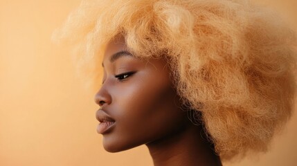 Fototapeta premium Young African American woman in serene studio portrait