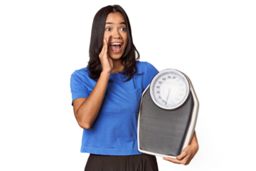 Filipino woman with scale in studio shouting and holding palm near opened mouth.