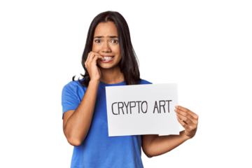 Woman with "crypto art" sign in studio biting fingernails, nervous and very anxious.