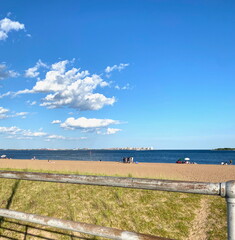 Fototapeta premium A beach in Staten Island, New York, with the Atlantic Ocean in the distance. 