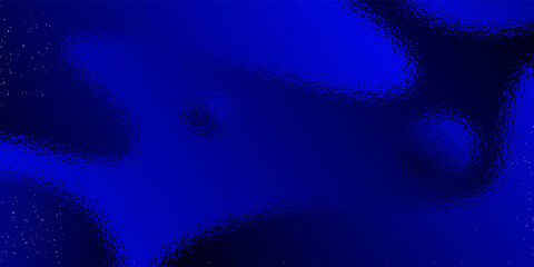 The image is a blurry blue ocean with many small circles scattered throughout the water. The circles are likely reflections of the sun or other light sources, creating a dreamy and ethereal atmosphere
