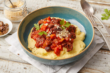 Polenta with tofu and tomato sugo