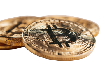 Close-up of gold-colored Bitcoin coins