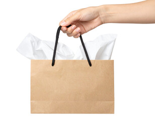 hand holding paper bag
