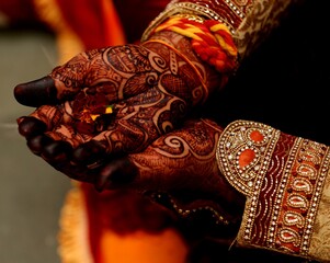 Traditional Indian Bridal Mehndi Hands with Floral Offering
