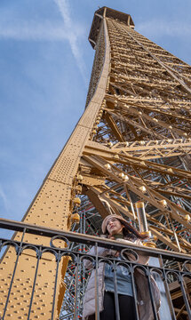 Woman enjoying a sunny morning at the Eiffel Tower