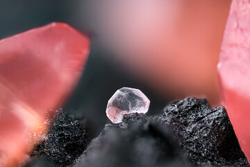 Clear Fluorite with red Rhodochrosite. Specimen from Uchucchacua Mine, Oyón, Peru. Micro...