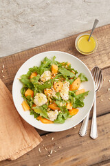 Mozzarella melon arugula salad