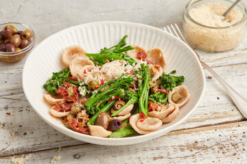 Orecchiette with broccoli, tomato and capers