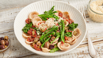 Orecchiette with broccoli, tomato and capers