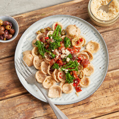 Orecchiette with broccoli, tomato and capers