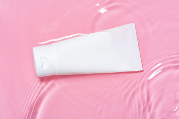 Cosmetic package amid refreshing water splashes