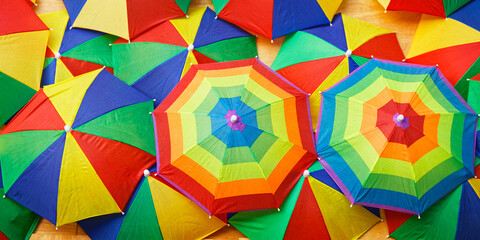 Colorful umbrellas. Positive background pattern.