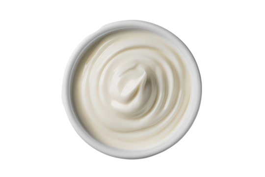Top view of a bowl of creamy white yogurt isolated on transparent background. Close-up view of smooth creamy mayonnaise in a white bowl isolated on white background.