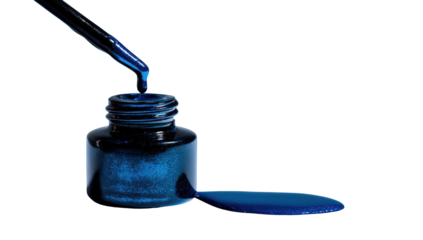 Dark ink dripping from a bottle