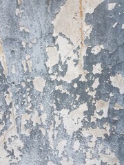 Old grunge painted plaster wall background