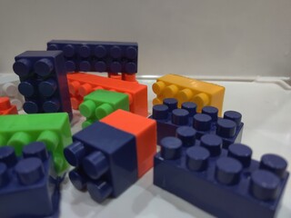 Colorful Building Blocks: A Close-Up View of Plastic Construction Bricks