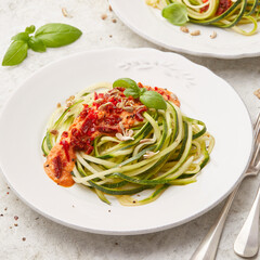 Raw zucchini with tomato sauce