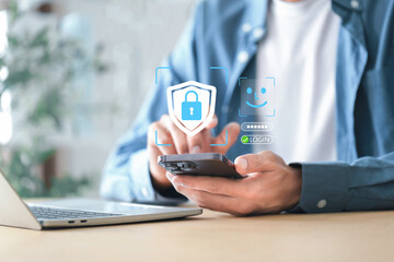 Secure login using facial recognition and password authentication , Businessman using smartphone and face recognition login , data protection, privacy, authentication, and online security.