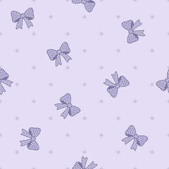 Seamless pattern of polkadot bow. Purple ribbon on polkadot pattern © nurfitriaamalia