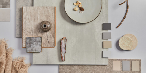 Creative flat lay design of stylish beige architect moodboard composition with samples of building, textile and natural materials and personal accessories. Top view,  white background, template.
