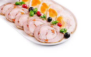 Culinary platter featuring savory rolled meats with colorful garnishes