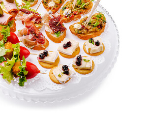 Delicious assortment of tapas served at a festive gathering in a modern setting