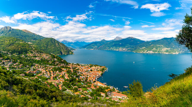 Panorama of Lake Como, photographed from the village of Croce, with the town of Menaggio and the mountains above it.
