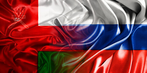 The national flags of Russia and Oman are combined into one and placed side by side on a fluttering...
