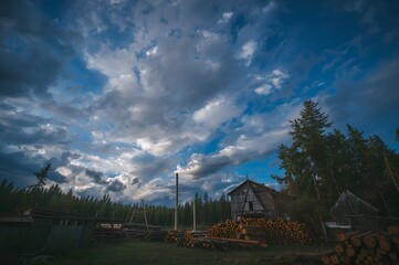 Dramatic sky over sawmill (lumber mill)