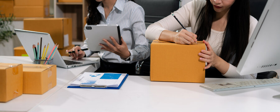 woman work in back office for checking the product in the warehouse, concept e commerce.