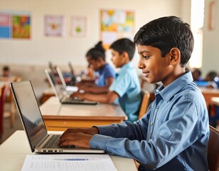 Asian boy typing on a laptop in a modest classroom