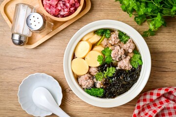 Clear Soup with Bean Curd and Minced Pork and seaweed , top view food table