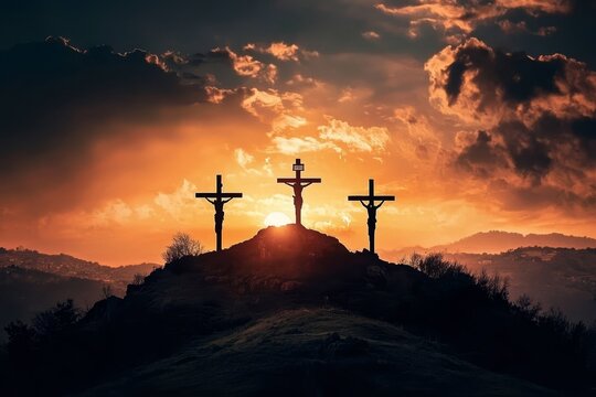 The silhouette of three crosses is highlighted by a beautiful sunset sky.