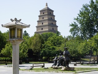Giant Wild Goose Pagoda with sculpture in front in Xian, China